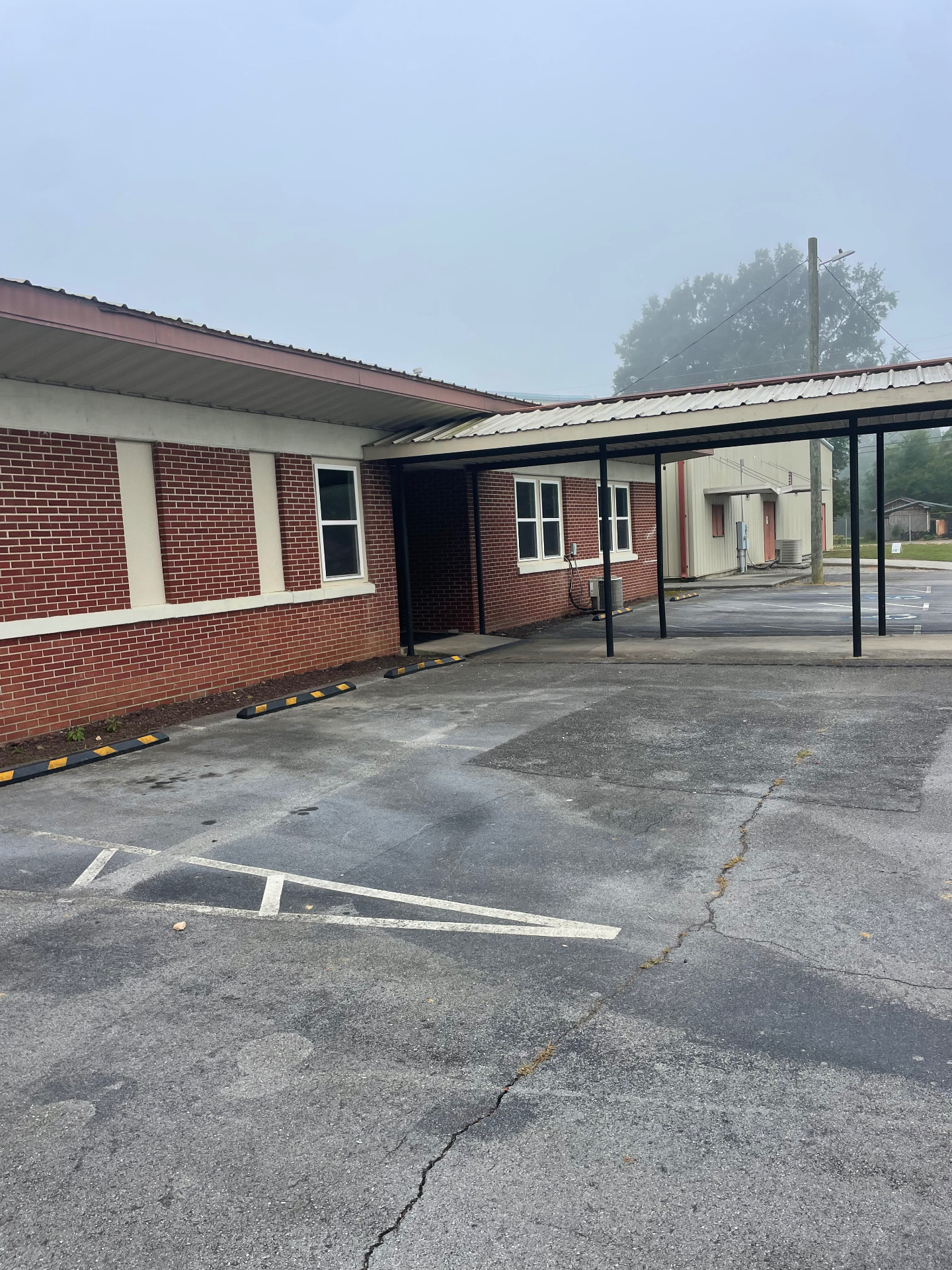 Commercial lot restripe — before