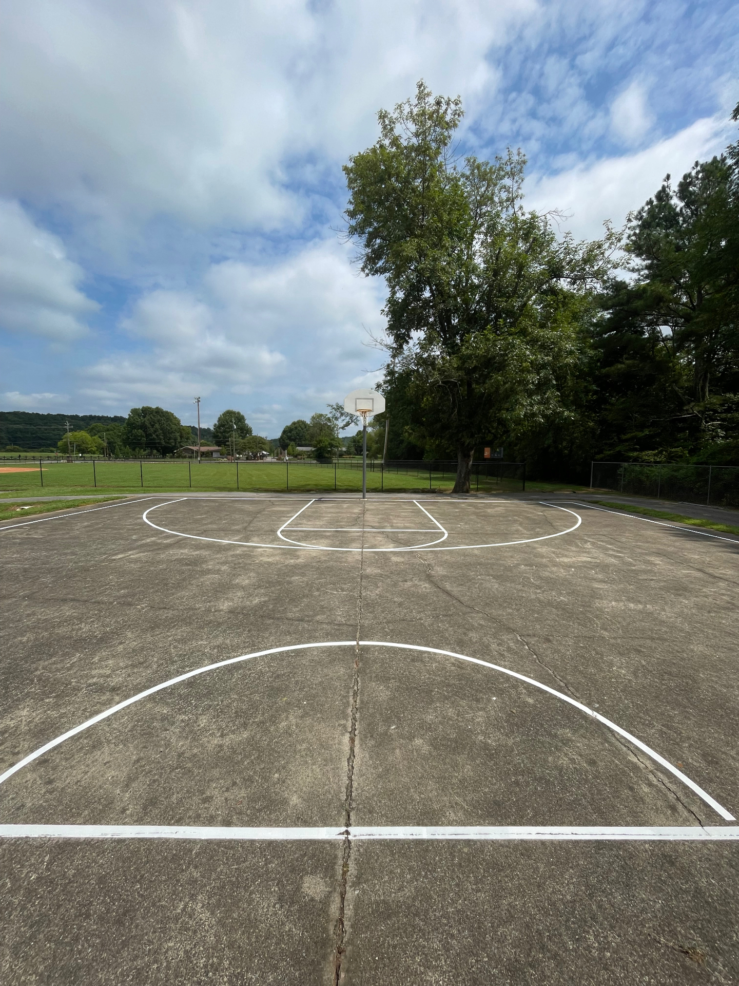 Basketball court line striping — after